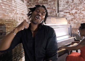 Solemn Brigham rides the “Dirty Whip” video